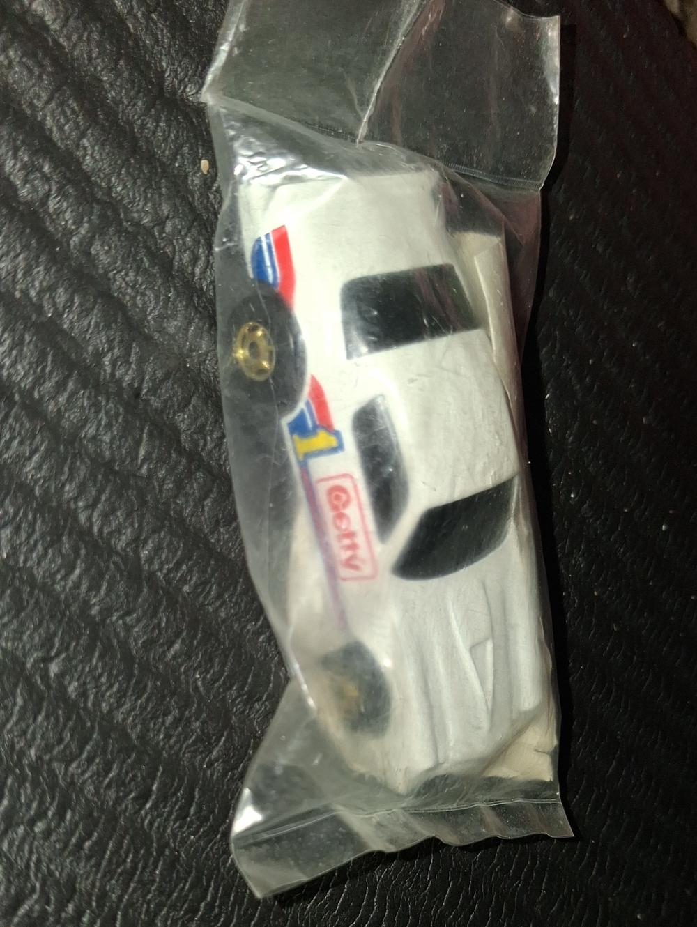 Vintage 1982 Getty Mattel White Race Car Toy with Red and Blue Stripes